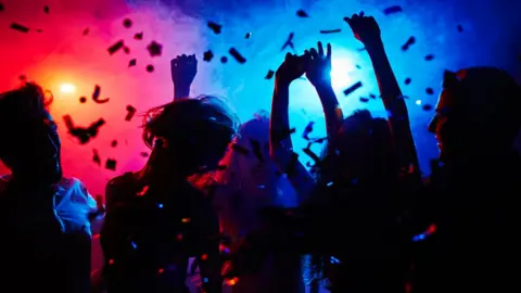Getty Images People out in a nightclub