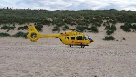 HM Coastguard Bacton Air ambulance at Sea Palling