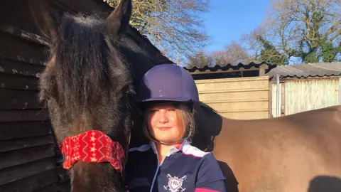 Isabel with her horse