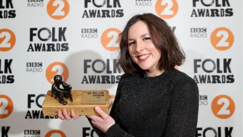 Mera Royle, a young harpist from the Isle of Man, won the Young Folk Award