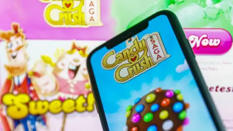 Getty Images A screenshot of Candy Crush on a mobile