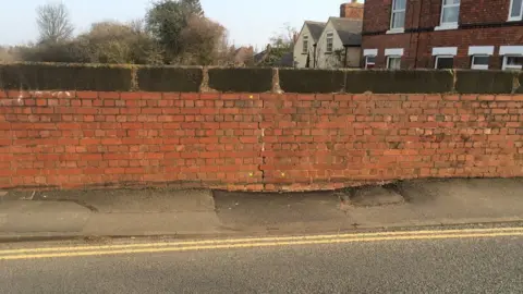 Cheryl Billson Cracks in the bridge wall, before the collapse took place