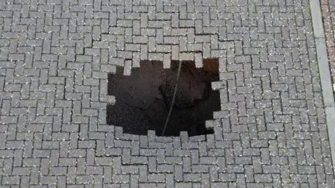 sinkhole in ground