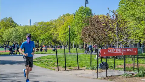 Getty Images Runners in a park