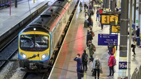 PA Media A train at Leeds station