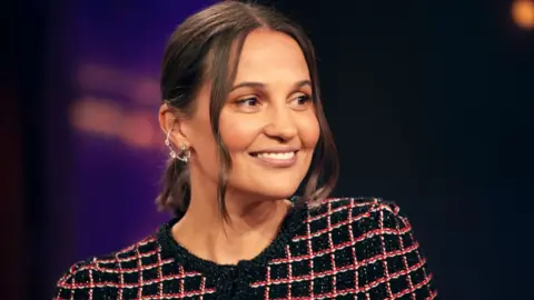 Alicia Vikander pictured on The Kelly Clarkson Show in March 2025