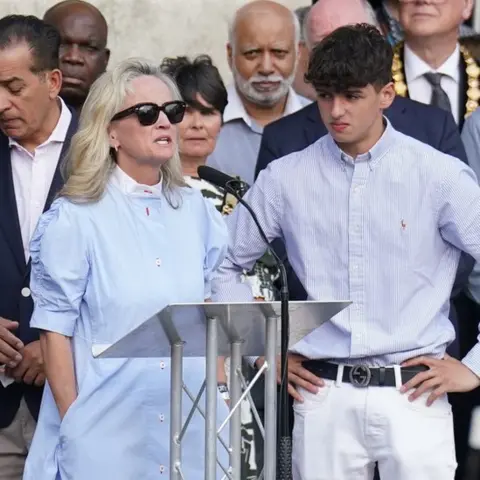PA Media Ms O'Malley-Kumar's mother Sinead addresses the crowd