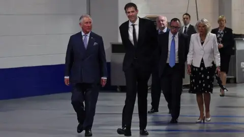 PA The Prince of Wales and the Duchess of Cornwall tour the Manchester Arena as part of a visit to Manchester