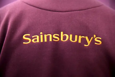 Reuters Generic Sainsbury's uniform