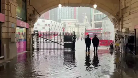 Londonstreetguide.com Flooding at the main entrance of Victoria Station on Wednesday afternoon