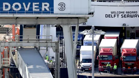 Getty Images Lorries arrive and depart from Dover Ferry Terminal