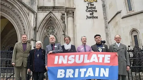 Elspeth Keep/PA Wire The seven Insulate Britain activists outside the court before their hearing on Tuesday