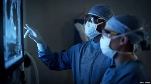 Getty Images Surgeons