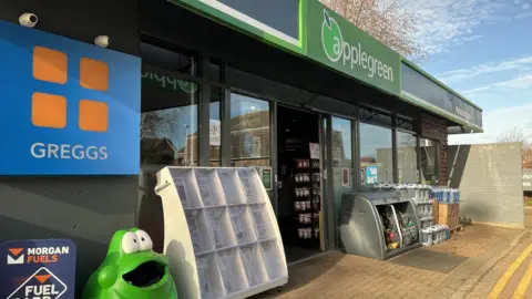 Emma Baugh Image of garage forecourt