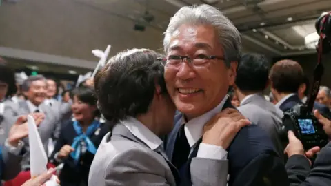 Reuters Tsunekazu Takeda shown celebrating in 2013 with the award of the Games to Tokyo