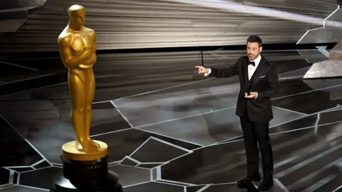 Getty Images Jimmy Kimmel at the 90th ceremony on stage