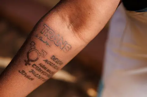 Getty Images A tattoo on a transgender man's arm.