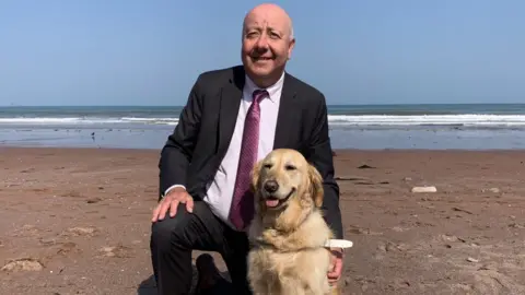 William Darling Councillor Steve Darling and his guide dog Jennie