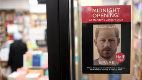 Getty Images A poster advertising the forthcoming publication of the book 'Spare' by Britain's Prince Harry, Duke of Sussex, is pictured in the window of a book store in London on January 6, 2023