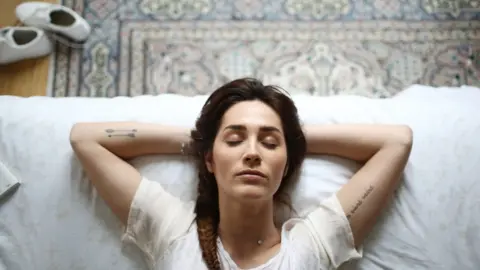 Getty Images Woman relaxing