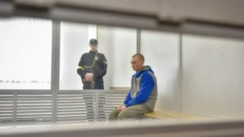 EPA Image shows Vadim Shishimarin sitting in dock