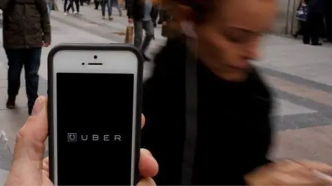 Getty Images Uber logo appears on a smartphone