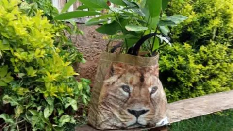 Hand Painted Weaved Backpack Genuine in Tan Leather with Embossed Lion