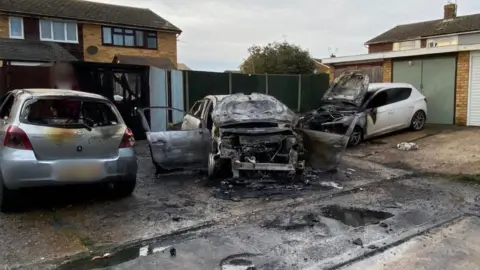 Three cars damaged by the fire