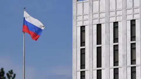 AFP/Getty Images The Russian flag flies at the embassy's compound in Washington DC