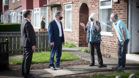 Press Association Sir Keir Starmer and Dr Paul Williams campaign on the doorstep in Hartlepool