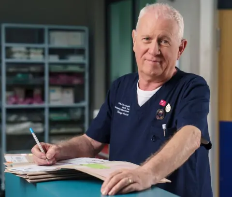 BBC Actor Derek Thompson on the set of Casualty