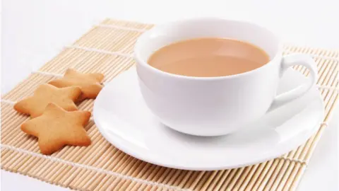 Getty Images A cup of tea and biscuits