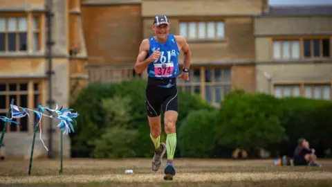 Steve Edwards Image of Steve Edwards running a marathon