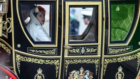 Getty Images Claire Foy as the Queen while filming The Crown tv programme