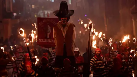 REUTERS/Toby Melville An effigy of Guy Fawkes is paraded through the streets