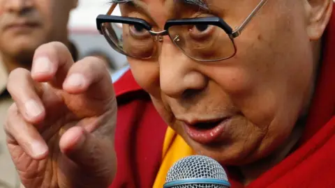 Reuters Tibetan spiritual leader, the Dalai Lama, speaks to students at a school in Mumbai, India, 8 December 2017