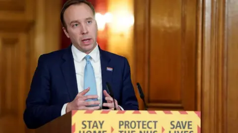 Getty Images Health Secretary Matt Hancock attending a remote press conference