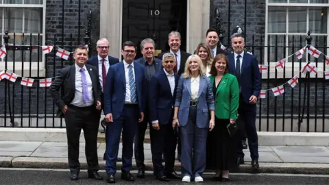 Reuters England's mayors pose outside No 10 Downing Street ahead of their meeting with Sir Keir Starmer and Angela Rayner