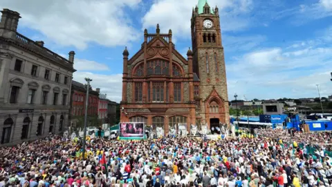 Pacemaker Supporters of the Bloody Sunday victims' families in Derry's Guildhall Square