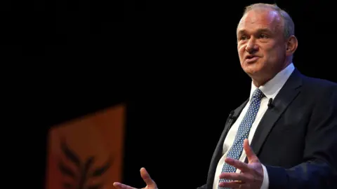 Sir Ed Davey delivers his keynote speech at the Lib Dem conference