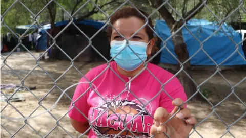 EPA Some people, like Maria Guadalupe, remain stranded on the border waiting for asylum in the US