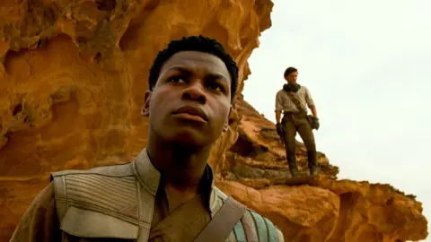 Lucasfilm John Boyega with Oscar Isaac in Star Wars: The Rise of Skywalker