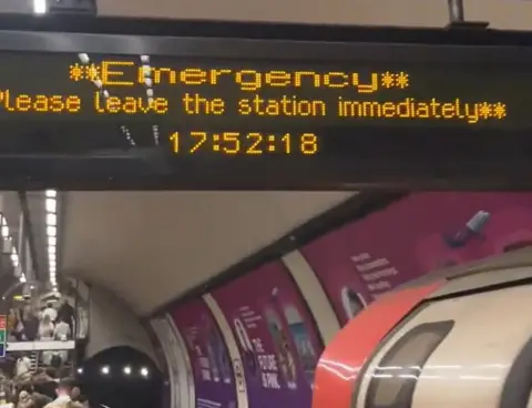 Nigel Ingofink/PA Emergency sign at Clapham Common station