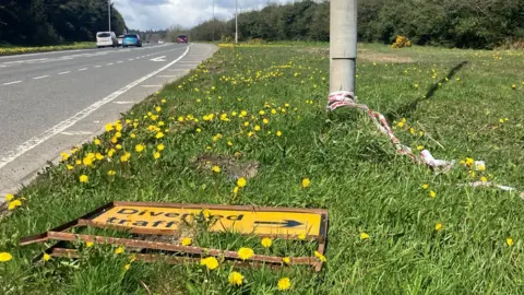 A diverted traffic sign near where the man's body was found