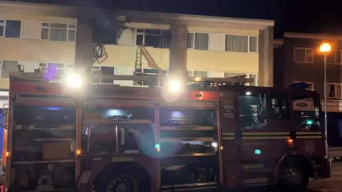 West Midlands Fire Service Crews attending the flat fire in Bartley Green