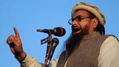 Getty Images Hafiz Saeed addresses an anti-Charlie Hebdo rally in 2015