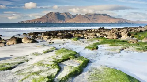 Getty Images Isle of Rum seen from the Isle of Eigg