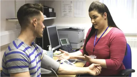 Getty Images GP with a patient