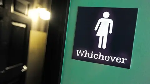 Getty Images A gender neutral bathroom sign in Durham, North Carolina