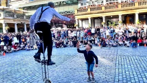 Man on unicycle